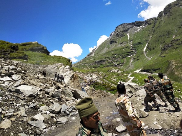 Border Roads Organisation involved in road clearing operations near Rohtang Pass on Manali-Leh highway on Wednesday. Photo/ANI
