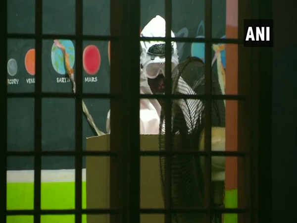 Wearing PPE kits, COVID-19 patients cast their votes at Thrikkakkara (Photo ANI)