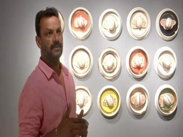 Vinod Daroz at his ceramic exhibition in Hyderabad's Kalakriti Art gallery. (ANI/photo)