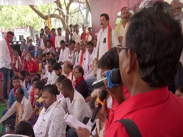 A speaker addressing the gathering of opposition leaders and relatives on May 11 whose children failed in the intermediate exam allegedly due a 'goof-up' in the results. (File Photo)