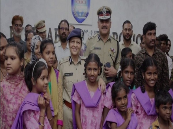 Hyderabad police officials with some of rescued children