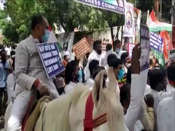 TPCC leaders protest against Central govt due to hike in petrol and diesel prices on Monday. (Photo/ANI)