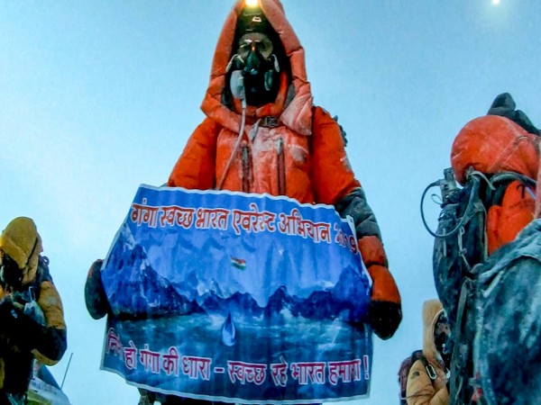 IAS Ravindra Kumar on the peak of Everest with 