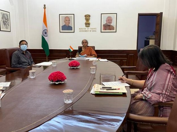 Finance Minister Nirmala Sitharaman (centre)