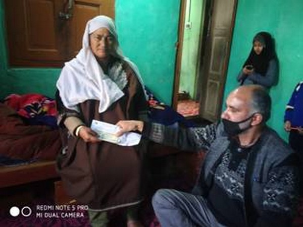 Door-step pension being delivered at Baramulla in J-K. 