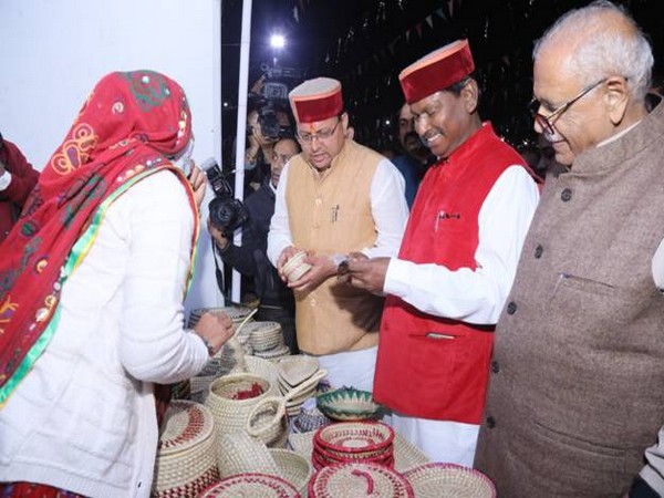 Union Minister Arjun Munda and Uttarakhand Chief Minister Pushkar Singh Dhami at the Uttarakhand Tribal Festival.