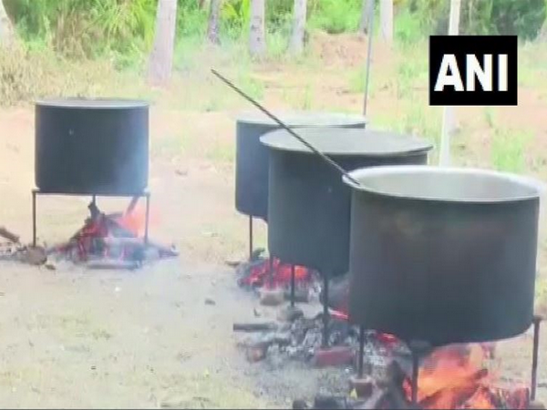 Open stoves set up to prepare over 300 kgs of biryani at Meerapalli mosque