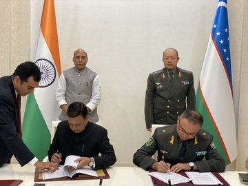 Defence Minister Rajnath Singh and his Uzbekistan counterpart Major General Nizamovich witness the signing of three MoUs in Tashkent on Saturday. 