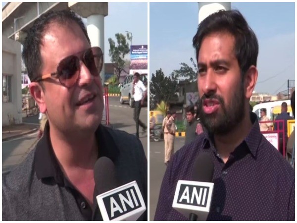 Rahul Walia from New Jersey and Jay Kansara from Washington arrive at Motera Stadium on Sunday
