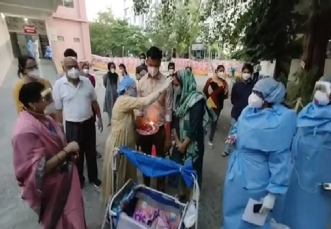 A visual of the woman being discharged from the hospital in Indore on Saturday. 