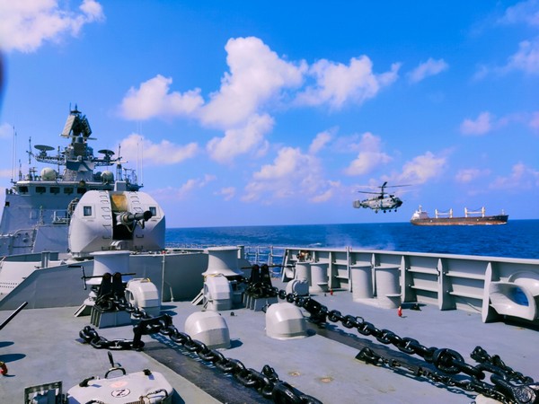 INS Trikand escorts a World Food Programme ship.