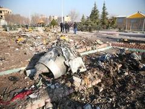 Debris of a Ukrainian Boeing 737 aircraft that crashed after taking off from Iran's Imam Khomeini airport on Wednesday