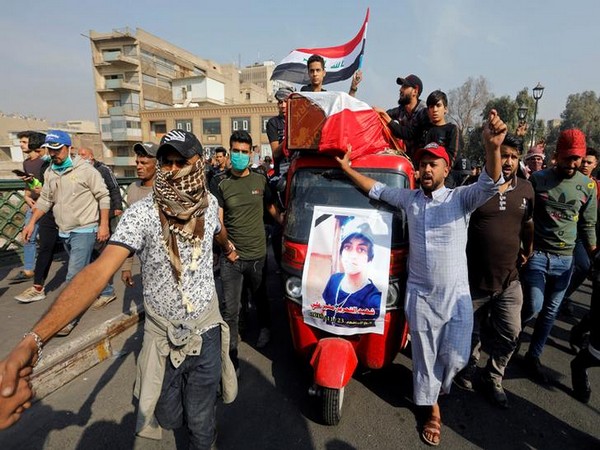 People transport the coffin of a demonstrator who was killed during an anti-government protest on Sunday.  
