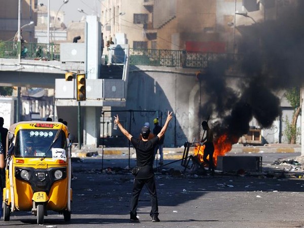    A demonstrator gestures during the ongoing anti-government protests in Baghdad on Saturday