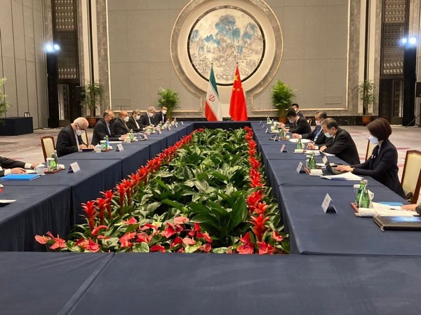 Iranian FM Hossein Amir Abdollahian hold talks with Chinese counterpart Wang Yi in Wuxi, China. (Image credit: Twitter/@IRIMFA_EN)