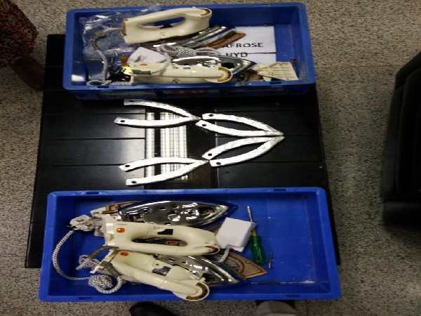 Customs Department officials seized four gold bars concealed in four iron boxes at the airport in Hyderabad in Telangana.