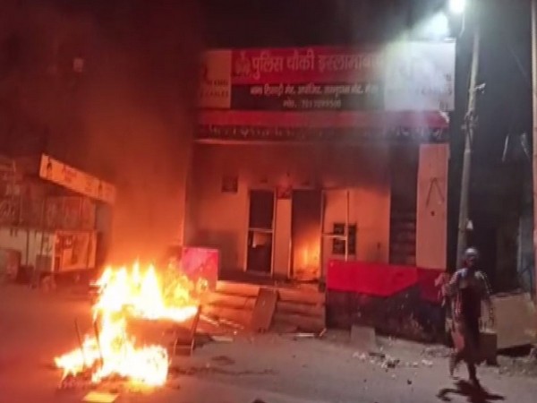 A policeman at a police post which was set on fire by protesters in Meerut on Friday. Photo/ANI