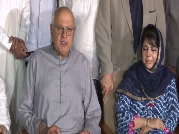 National Conference chief Farooq Abdullah and PDP president Mehbooba Mufti in Srinagar on Sunday. Photo/ANI