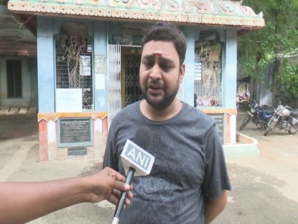 Jitu, one of the devotees at Meenakshi Amman Temple on Sunday in Madurai. Photo/ANI