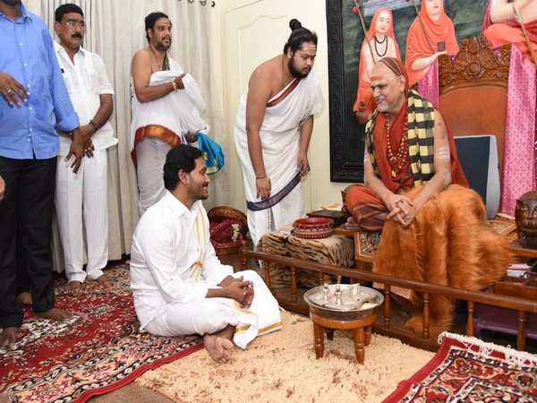 Andhra Pradesh Chief Minister Jagan Mohan Reddy seeking blessings of Swami Swaroopananda Saraswati