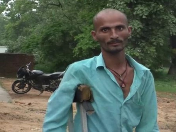 Jagdamba Singh, specially-abled drives an auto-rickshaw to support his family. Photo/ANI