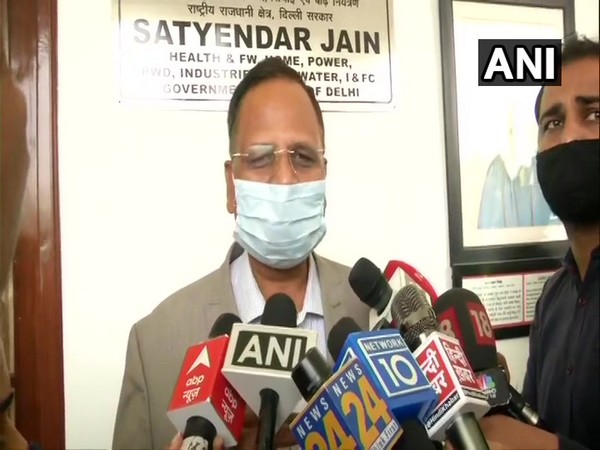 Delhi Home Minister Satyendra Jain speaking to reporters. (Photo/ANI)