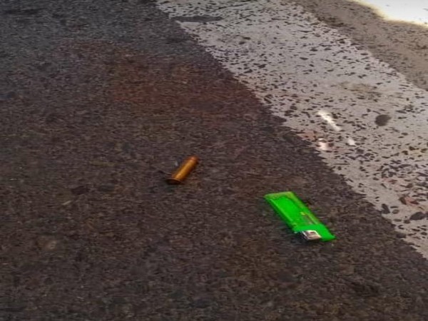 A bullet and a lighter at the incident spot. Photo/ANI