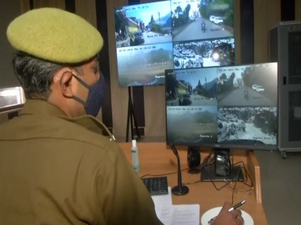 A police official monitoring the highway with the help of highway patrol vehicles from police control room. (Photo/ ANI)