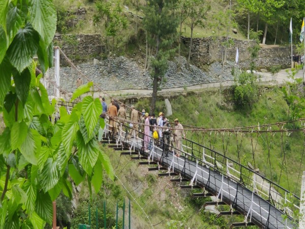 Bandipura youth repatriated from PoK at Tithwal Bridge in J-K's Karnah on Monday. (Photo/ANI)
