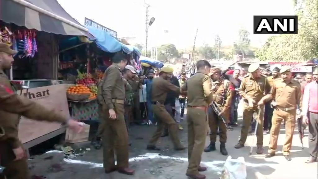 Police at the Jammu bus stand. Photo/ANI
