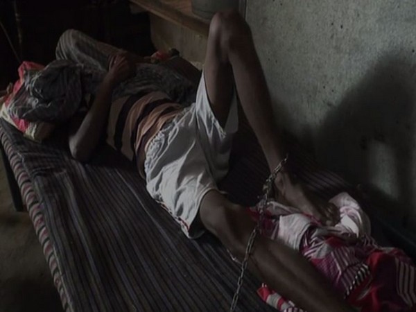 Jasbeer Singh, drug addict who has tied up with chains by his parents in Firozpur, Punjab.