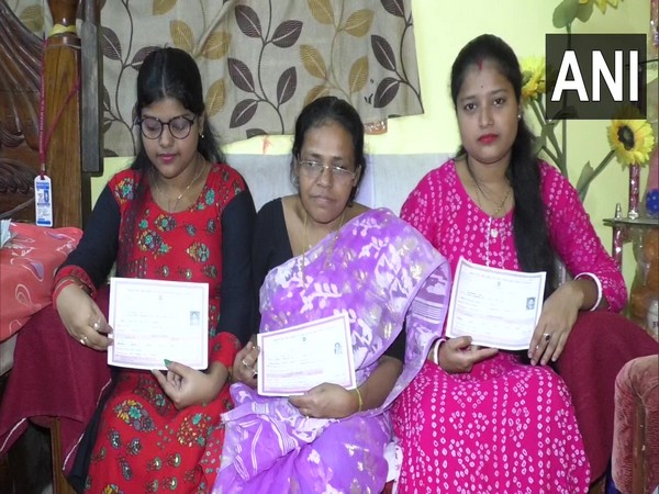 Shila Rani Das along with her two daughters Rajasree and Jayasree in Agartala.