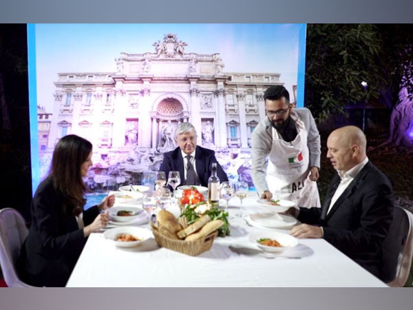 The winner of World Week of Italian Cuisine 2020, Karan Tripathi serves his winning dish to the Ambassador of Italy to India Vincenzo de Luca and his team