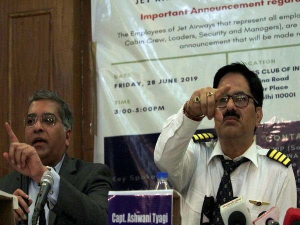 AdiGroup founder Sanjay Viswanathan, left, along with Jet Airways employee A Tyagi addressing a press conference in New Delhi on June 28. Photo/ANI