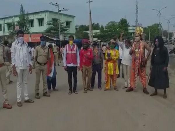 Yamraj walks the streets of Rajam town  to raise awareness about Covid-19 (Photo: ANI)