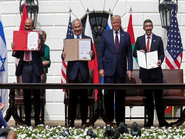 Bahrain's FM Abdullatif Al Zayani, Former Israel's PM Benjamin Netanyahu, UAE FM Abdullah bin Zayed, Former President Donald Trump signing of Abraham Accords, Sept 15, 2020 (Photo Credit: Reuters)