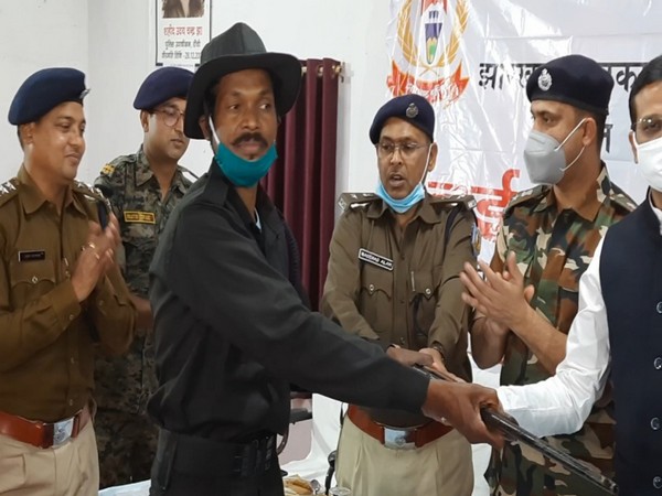 A visual from of the wanted Naxal surrendering before the district administration in Ranchi.