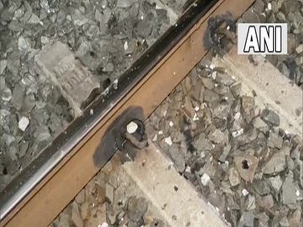 Visual of a broken cement pole on railway track near Atul Railway Station (Photo/ANI)