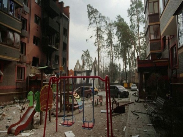 A view of a children's playground next to a destroyed building, amid Russia's invasion of Ukraine, in Irpin, Ukraine (Photo Credit: Reuters)