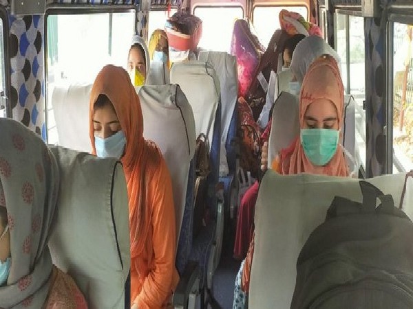 A visual of the stranded students going to Jammu and Kashmir by a bus. 