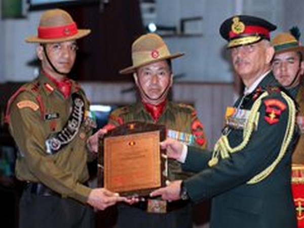 Lt Gen YK Joshi presents award to a soldier at Udhampur on Thursday. Photo/ANI