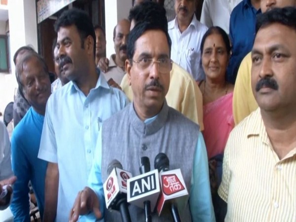 Union Minister Prahlad Joshi talking to reporters in Hubli on Saturday. Photo/ANI