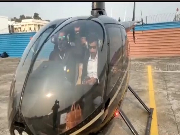Officials of Bihar's Department of Prohibition and Excise in chopper (Photo/ANI)