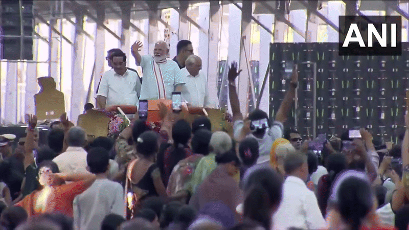 Prime Minister Narendra Modi holds roadshow in Surat (Photo/ANI)