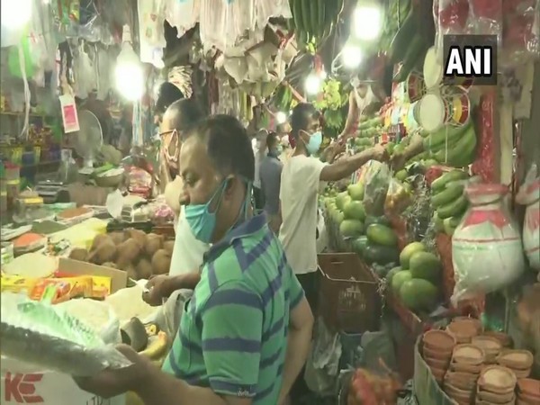 People buy essentials before lockdown in Guwahati. (Photo/ANI)