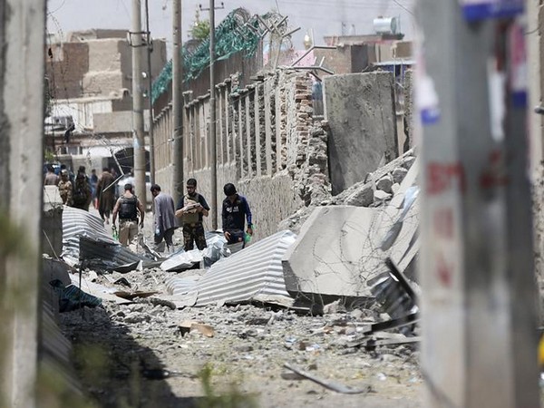 Afghan personnel inspecting the site of a car bomb blast in Kabul on August 7 (Photo/Reuters)