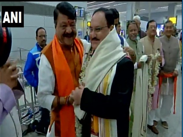 Kailash Vijayvargiya (L) greets JP Nadda at Kolkata airport on Monday [Photo/ANI]