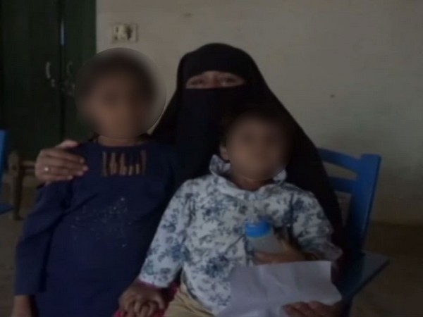 The woman along with her two daughters 