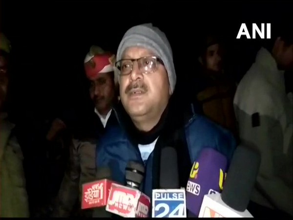 District Magistrate Ravindra Kumar speaking to reporters in Kannauj on Friday. 