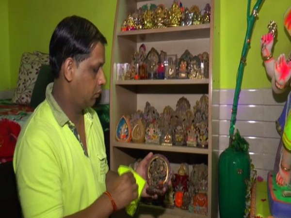 Vikas Shrivastav with his collection. Photo/ANI